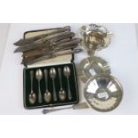 A collection of fully hallmarked sterling silver items to include two ashtrays, a bonbon dish, a