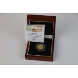 A cased London Mint office Italy King Victor Emmanuel III gold 50 Lire coin, complete with C.O.A.
