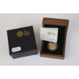 A cased The Royal Mint office 2009 UK Gold Sovereign proof coin, complete with C.O.A. and outer box.