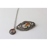 Moss agate and full set marcasite silver marquise shaped brooch, the oval cabochon cut moss agate
