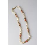 Pearl and coral 9ct yellow gold necklace, cultured cream pearls with pink lustre, carved pink