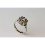 Diamond 18ct white gold cluster ring, principle round brilliant cut diamond weighing approx 0.20