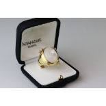 Mother-of-pearl and diamond 18ct yellow gold ring, the cabochon cut mother-of-pearl measuring approx