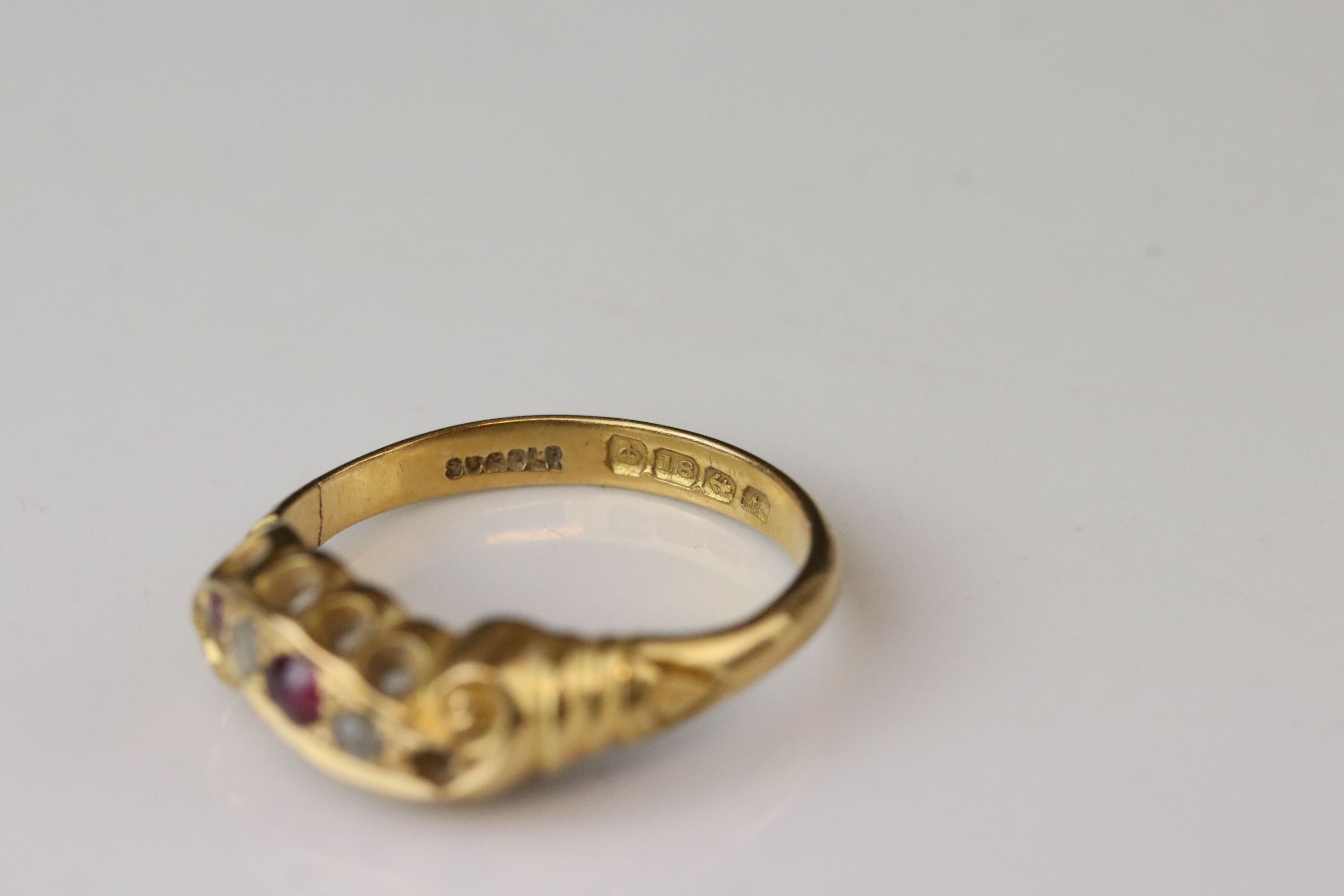 Early 20th century ruby and diamond 18ct yellow gold scroll head ring, two small round mixed cut - Image 3 of 6