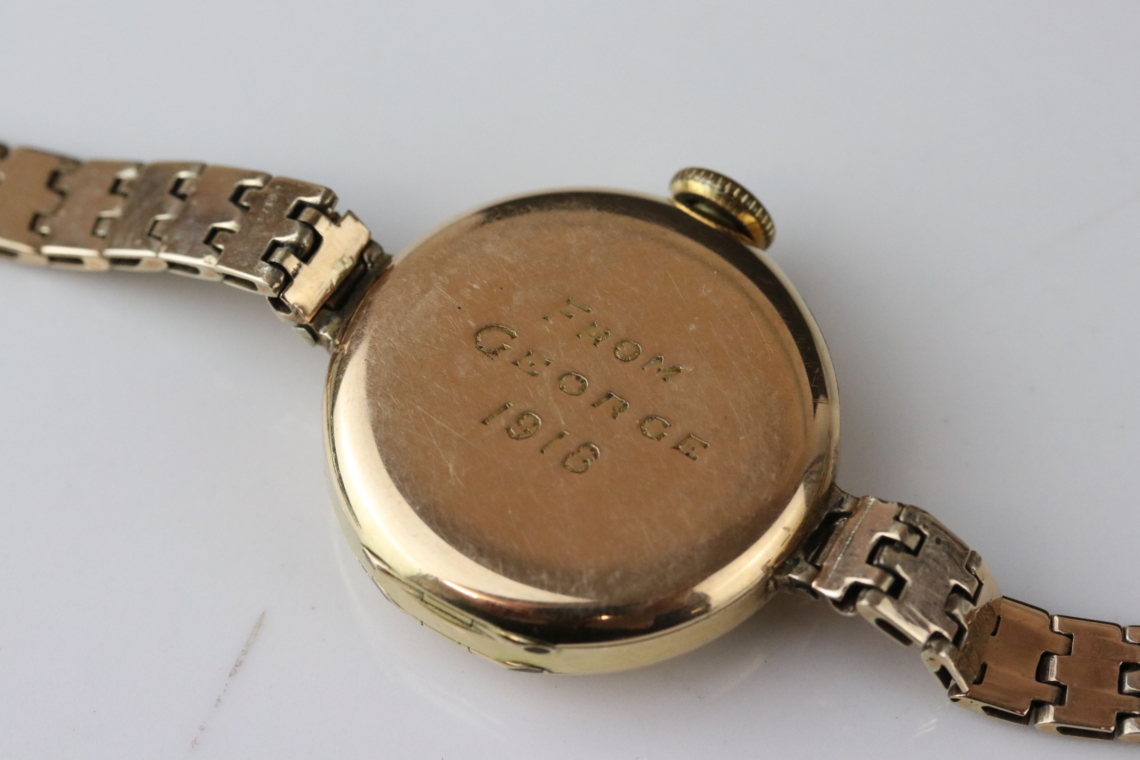 Early 20th century 9ct gold cased wristwatch, gold-coloured dial, black Arabic numerals and poker - Image 4 of 4