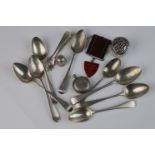 A collection of fully hallmarked sterling silver to include teaspoons, sugar tongs, sovereign case