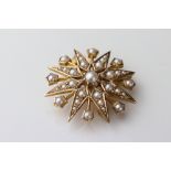 Pearl 9ct yellow gold sunburst pendant brooch, full set with thirty-three graduated seed pearls,