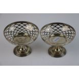 A pair of fully hallmarked sterling silver bonbon dishes with pierced decoration, maker marked for A