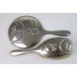 A fully hallmarked sterling silver hand brush and mirror set, maker marked for Deakin & Francis Ltd,