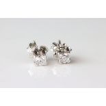 Pair of diamond 18ct white gold stud earrings, round brilliant cut diamond weighing approx 0.25