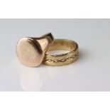 Rose gold signet ring, assessed as 9ct gold, oval panel (possibly with extremely rubbed monogram),