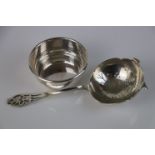 Silver tea strainer, pierced foliate terminal, makers Viners Ltd, Sheffield 1937 together with