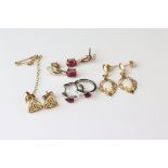 Four pairs of 9ct gold drop and stud earrings to include opals and rubies (4)