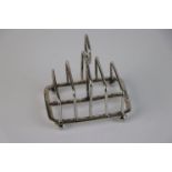 A fully hallmarked sterling silver Art Deco graduated five bar toast rack, maker marked for Atkin