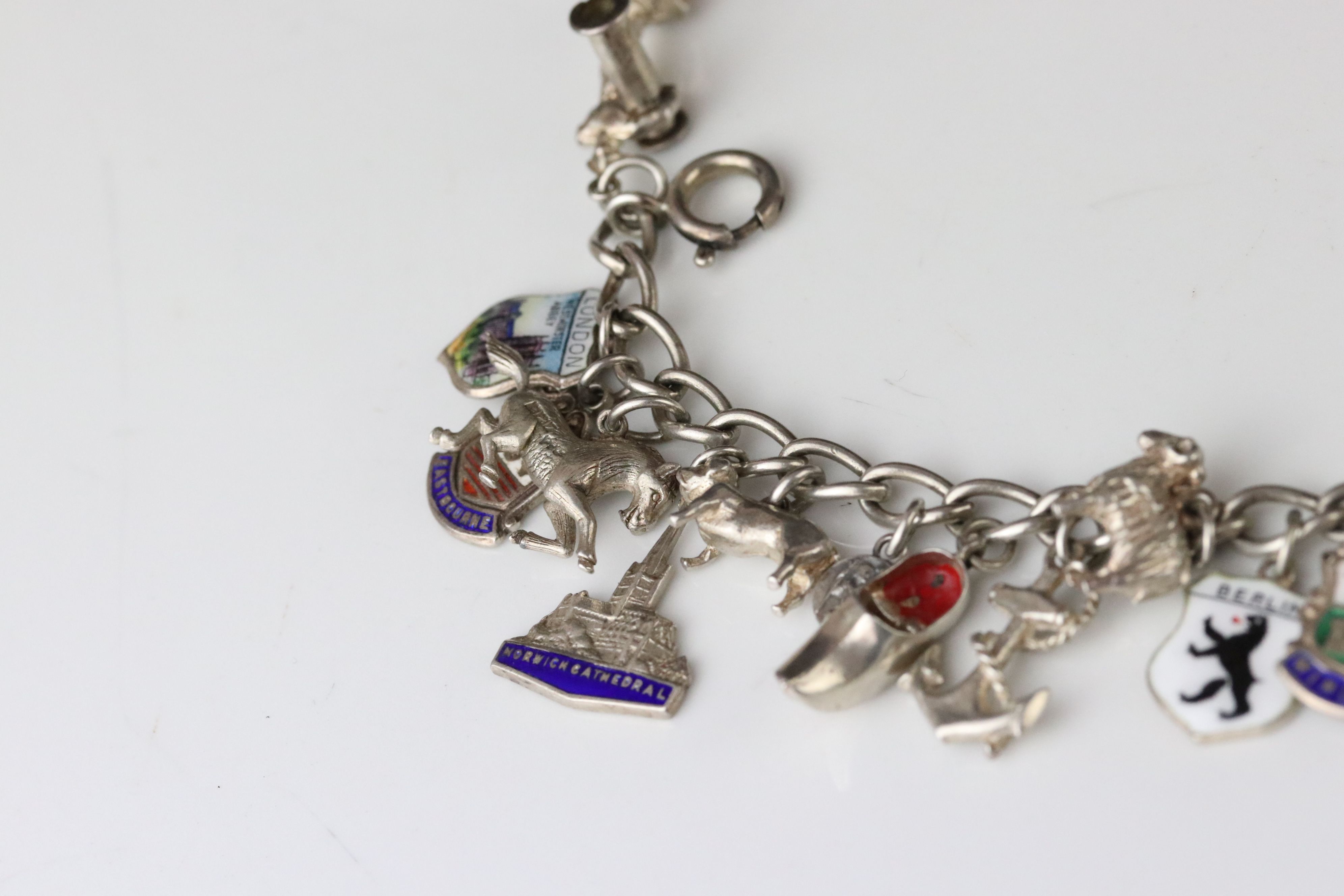Silver curb link charm bracelet with eighteen silver and white metal charms, length approx 23cm ( - Image 9 of 15