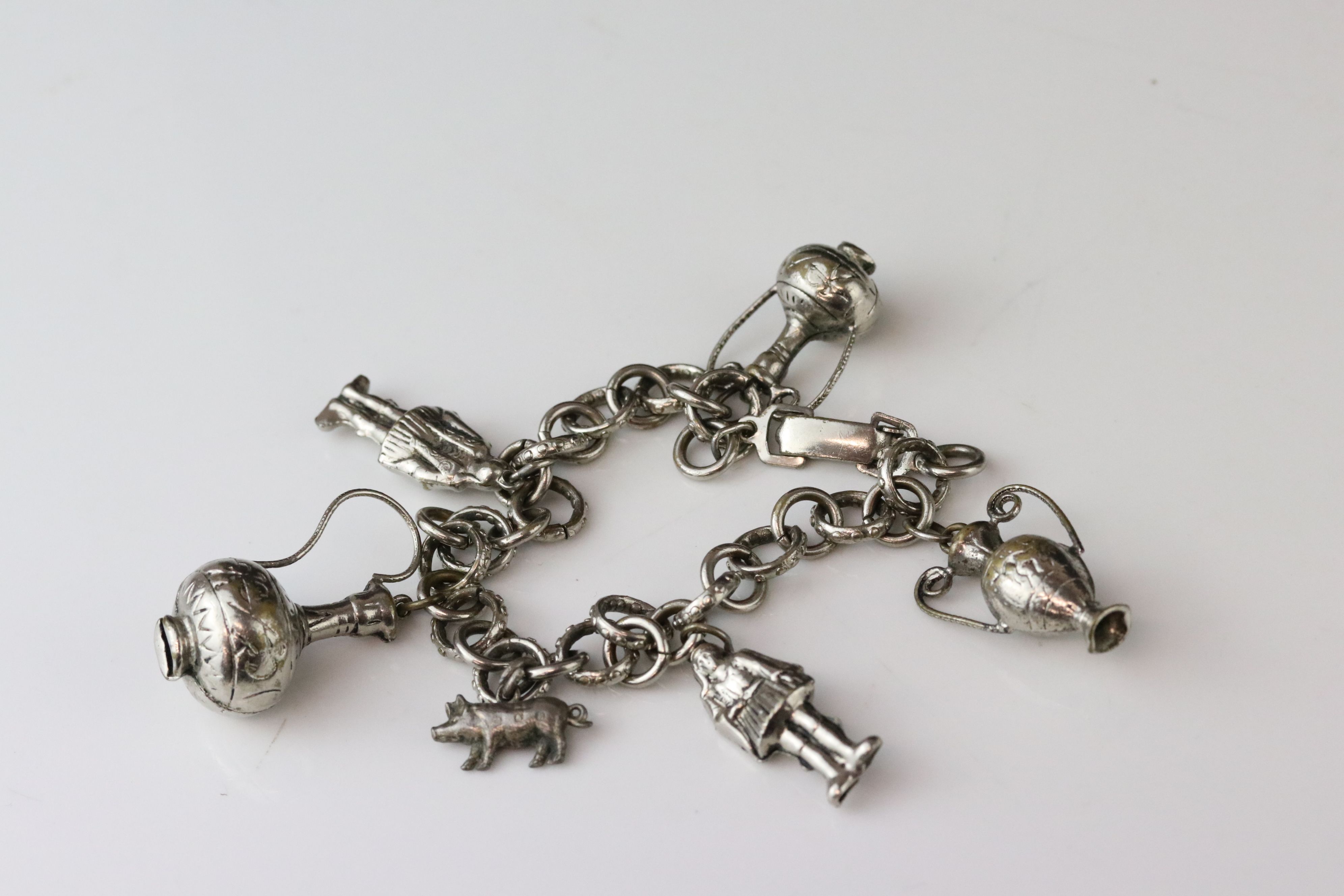 Silver curb link charm bracelet with eighteen silver and white metal charms, length approx 23cm ( - Image 13 of 15