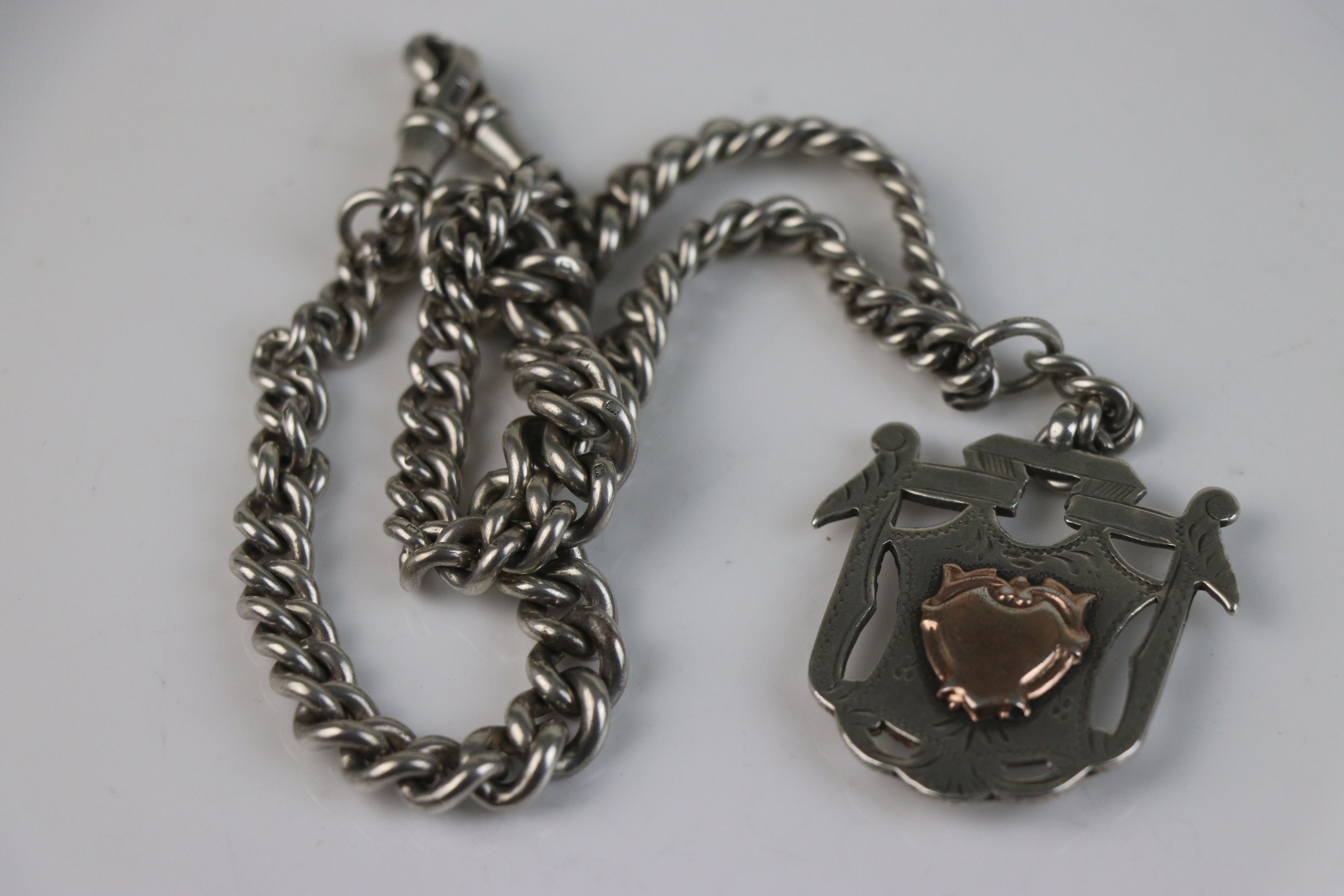 A fully hallmarked sterling silver double graduated Albert chain complete with watch fob with rose - Image 3 of 5