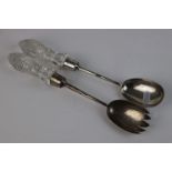 A pair of fully hallmarked sterling silver salad servers with cut glass handles, maker marked for