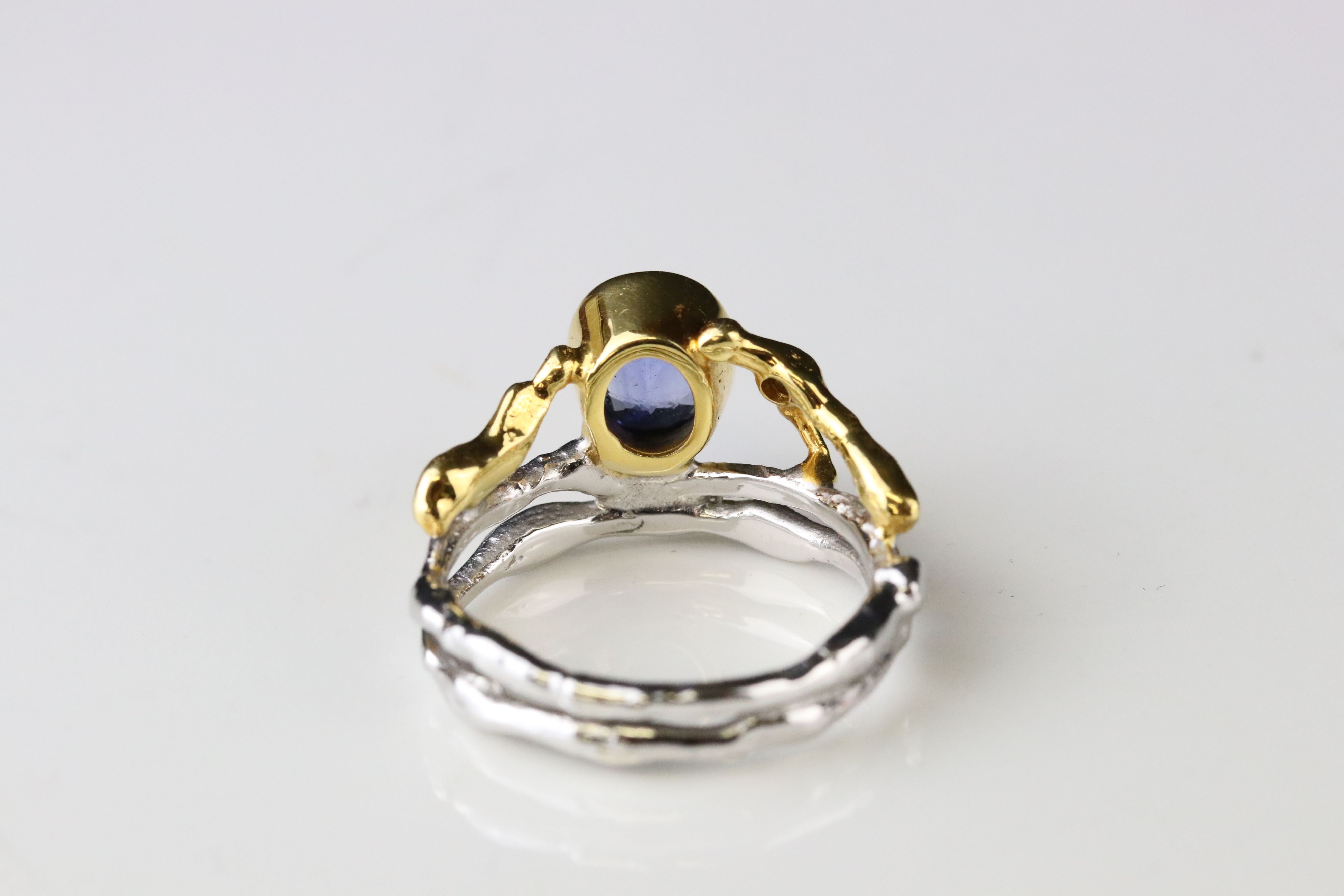 Sapphire 18ct yellow and white gold ring, the principle oval mixed cut blue sapphire measuring - Image 5 of 7