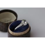 Diamond solitaire unmarked white gold ring, the cushion cut diamond weighing approximately 1.25