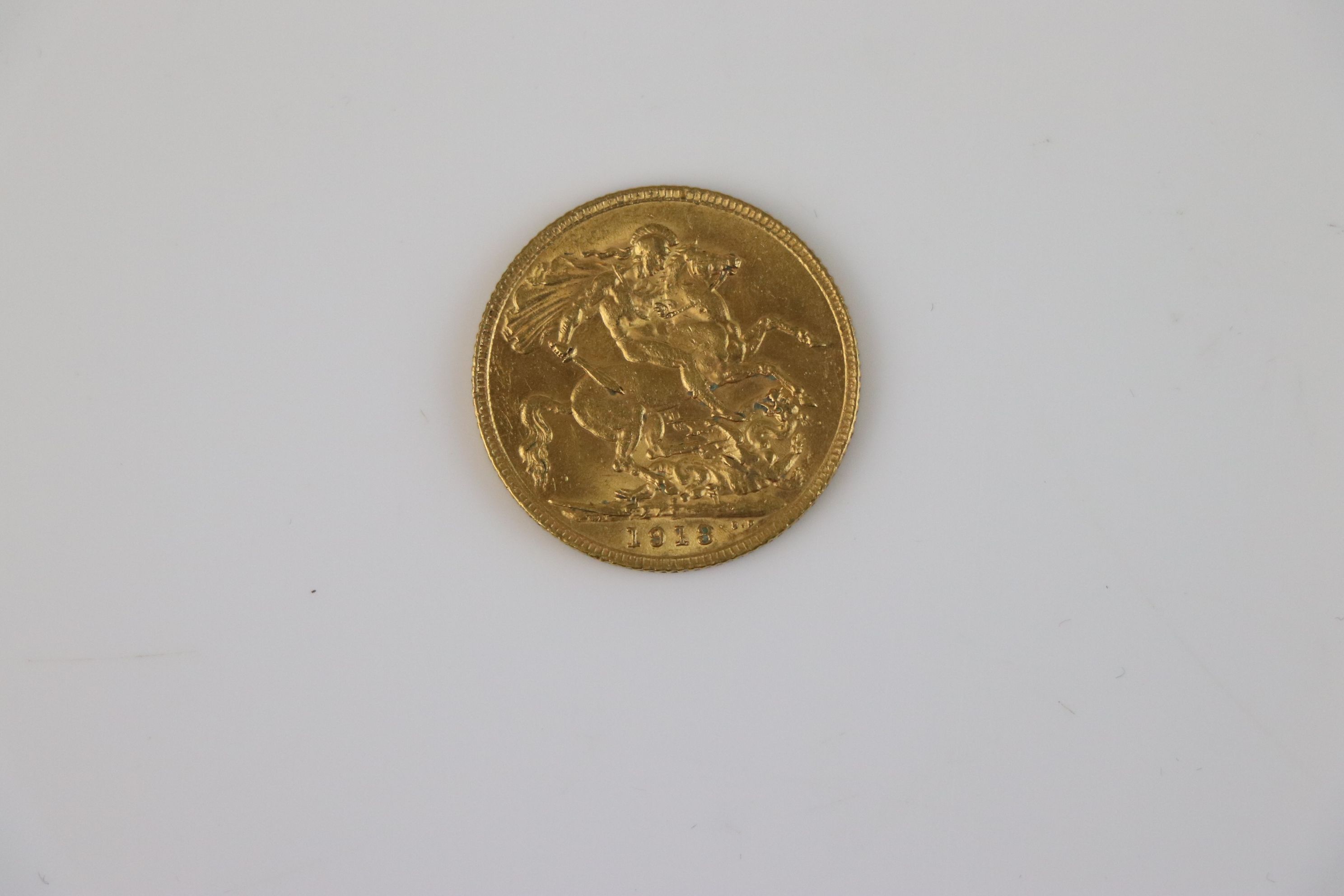 A King George V Full gold sovereign dated 1913.