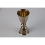 A fully hallmarked sterling silver double spirit measuring cup, maker marked for J B Chatterley &