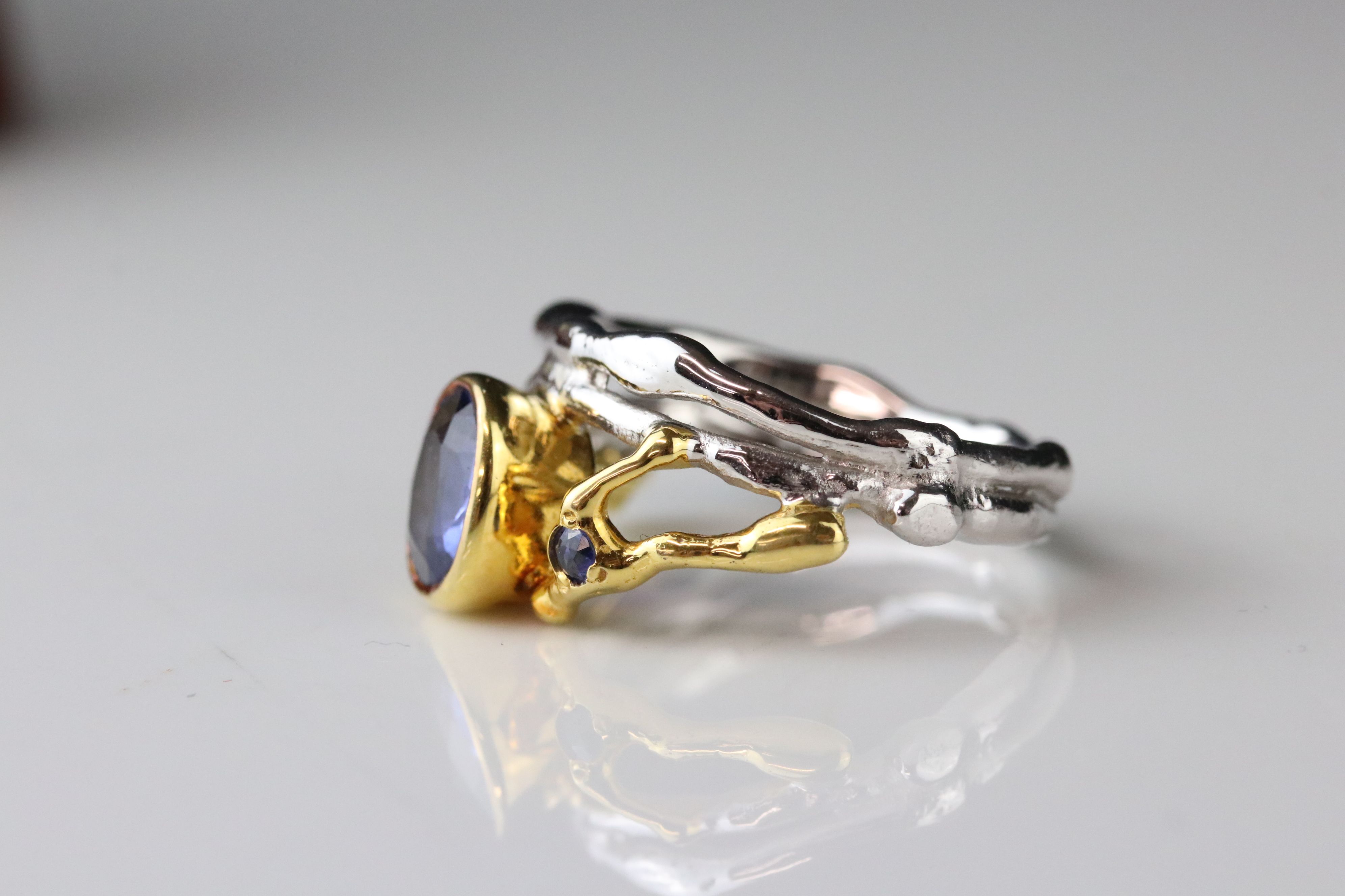Sapphire 18ct yellow and white gold ring, the principle oval mixed cut blue sapphire measuring - Image 3 of 7