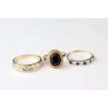 Three 9ct yellow gold dress rings, to include garnet, sapphire and paste (3)