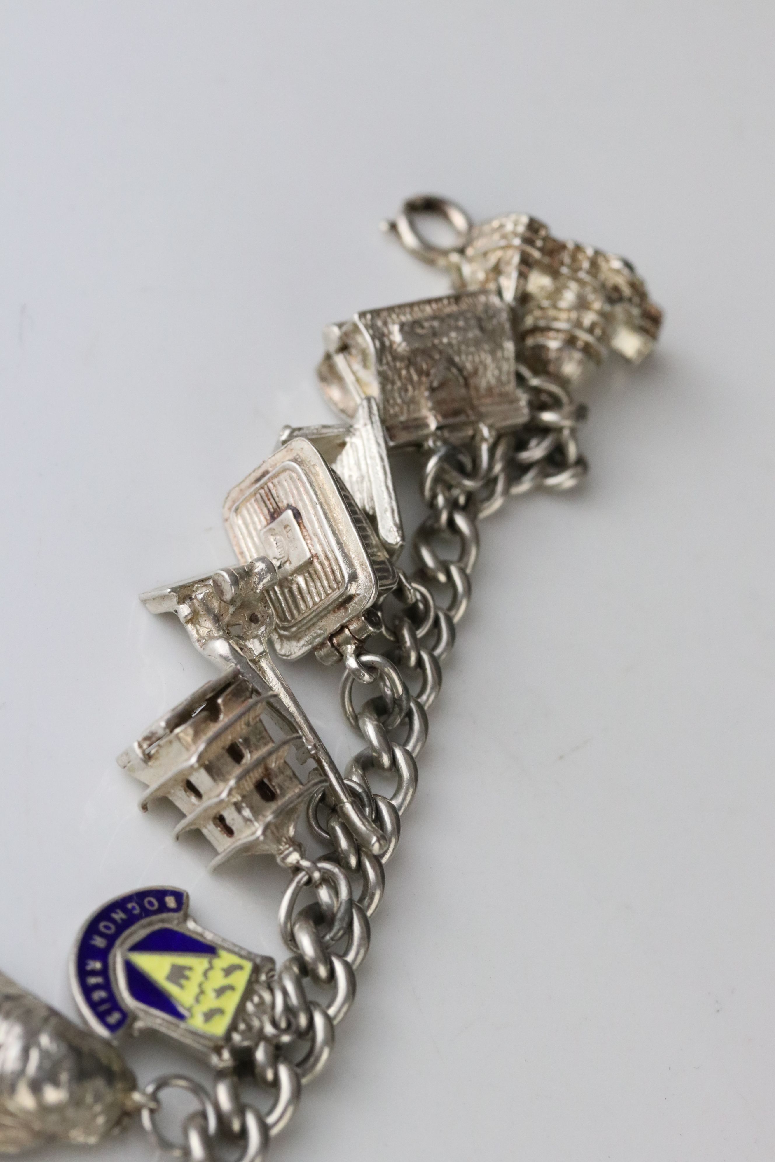 Silver curb link charm bracelet with eighteen silver and white metal charms, length approx 23cm ( - Image 4 of 15