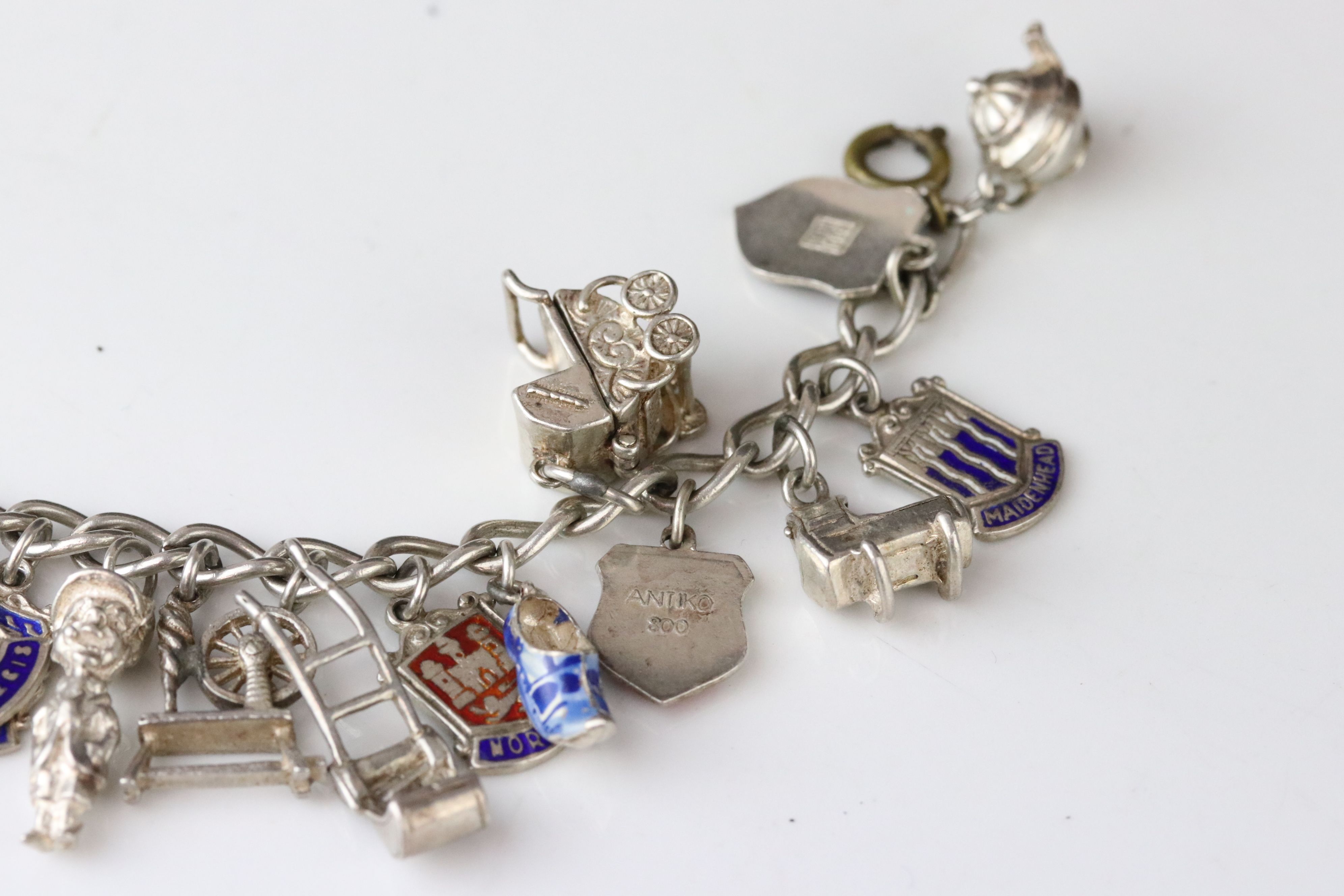 Silver curb link charm bracelet with eighteen silver and white metal charms, length approx 23cm ( - Image 7 of 15