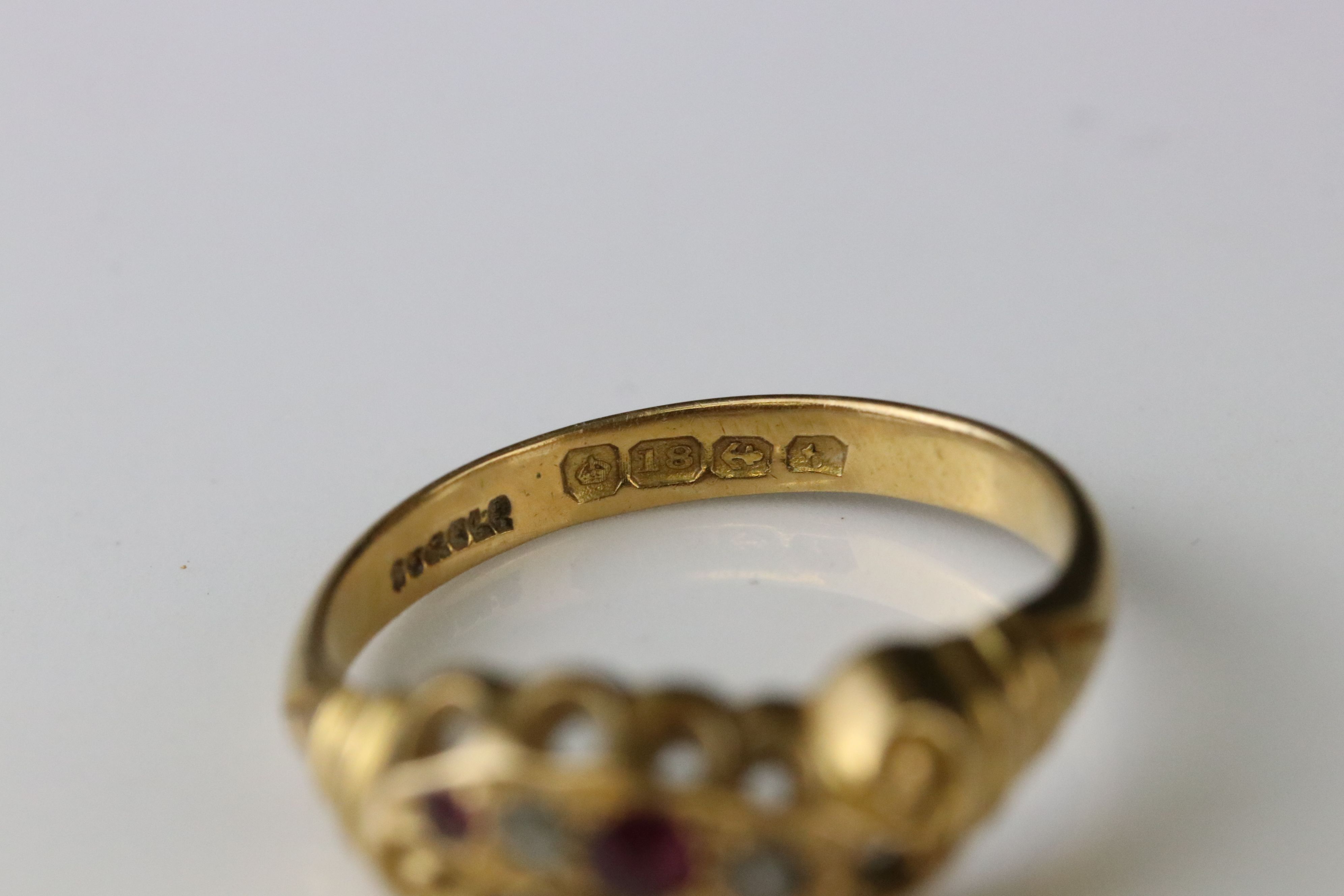 Early 20th century ruby and diamond 18ct yellow gold scroll head ring, two small round mixed cut - Image 6 of 6