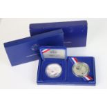 A United States silver liberty dollar coin set.