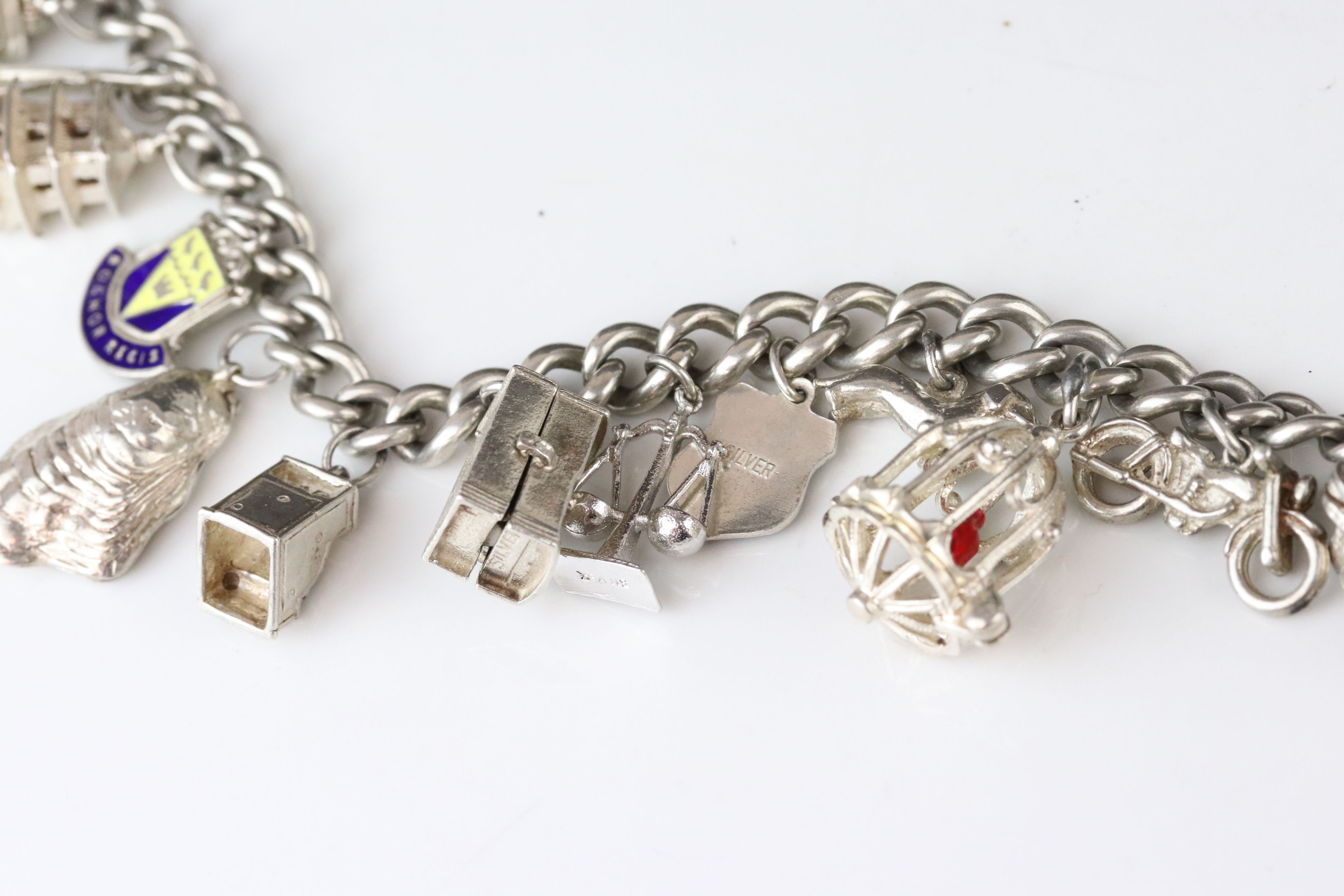 Silver curb link charm bracelet with eighteen silver and white metal charms, length approx 23cm ( - Image 3 of 15