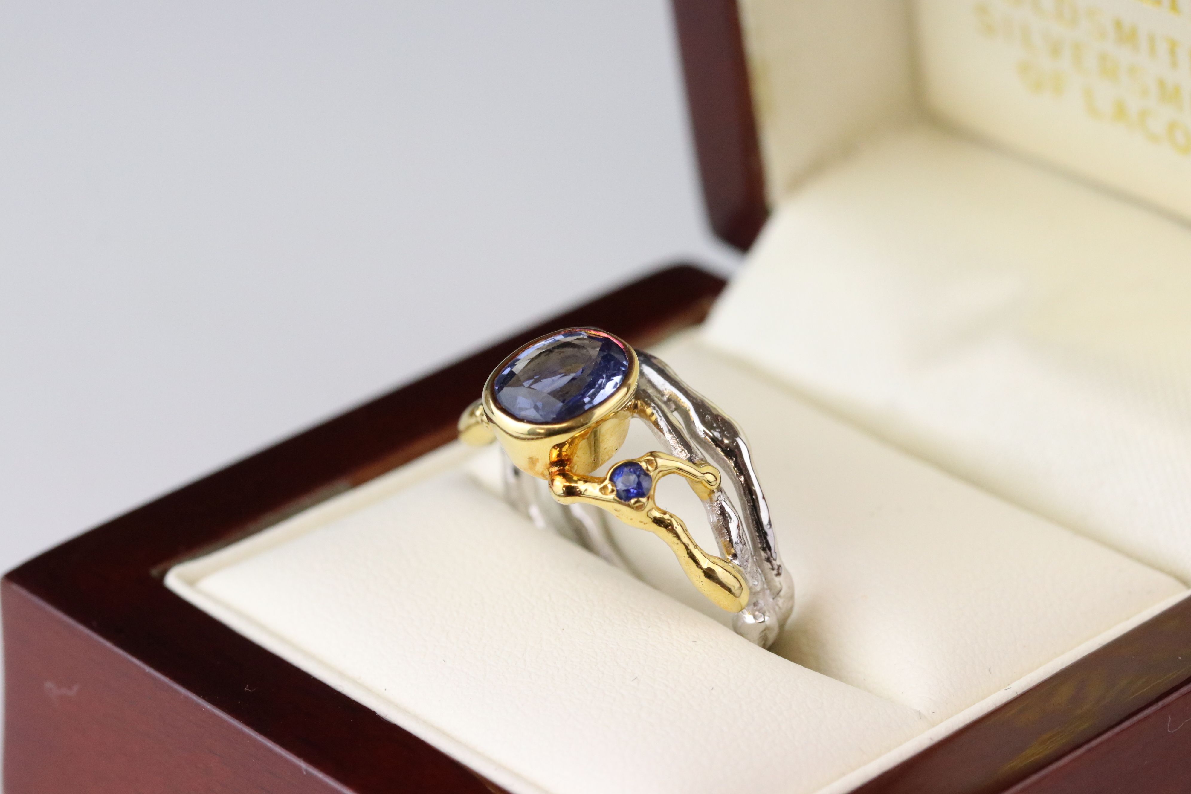 Sapphire 18ct yellow and white gold ring, the principle oval mixed cut blue sapphire measuring - Image 6 of 7