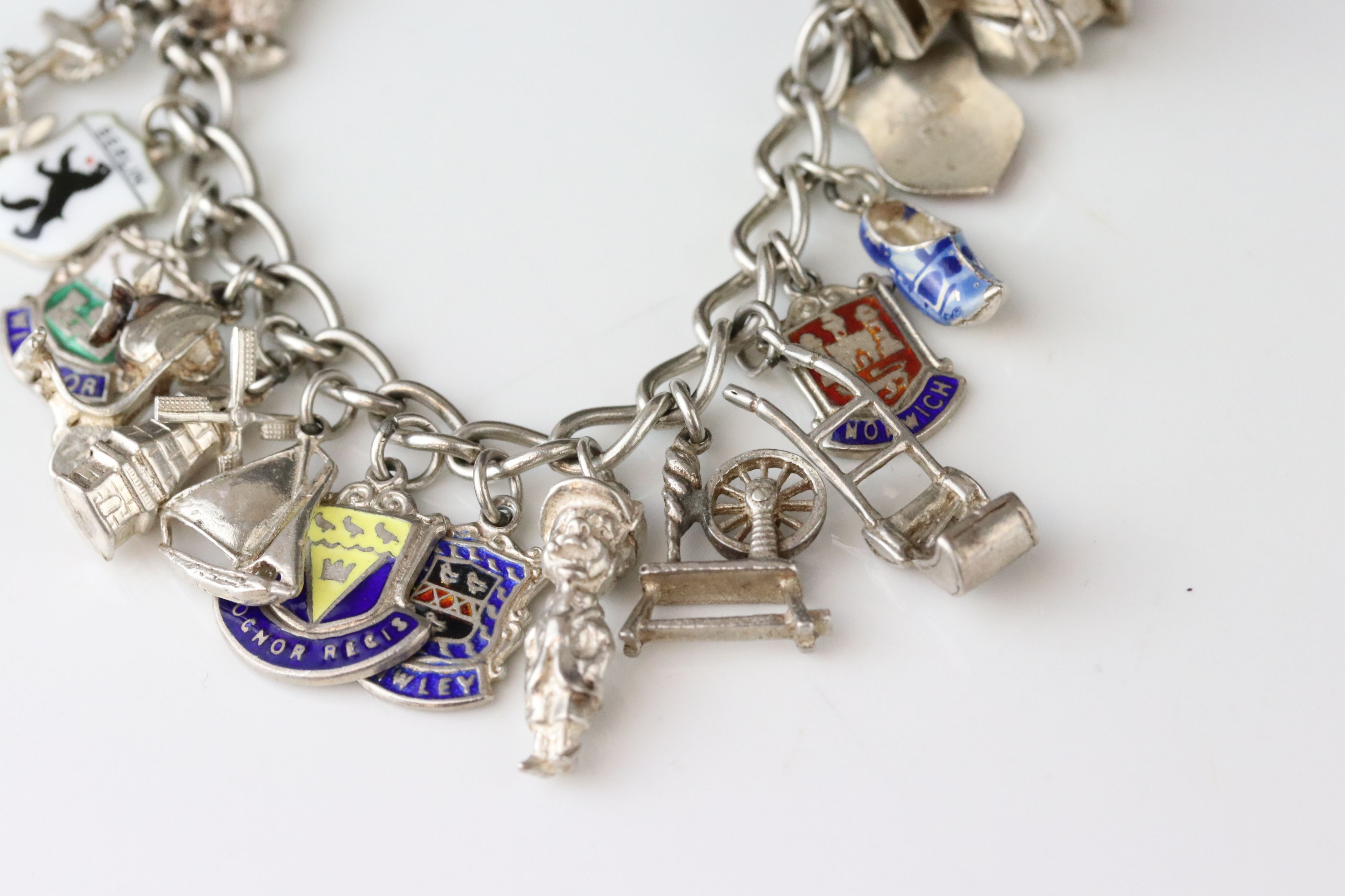 Silver curb link charm bracelet with eighteen silver and white metal charms, length approx 23cm ( - Image 11 of 15