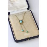 Edwardian turquoise 9ct yellow gold pendant necklace, the principle oval cabochon cut turquoise