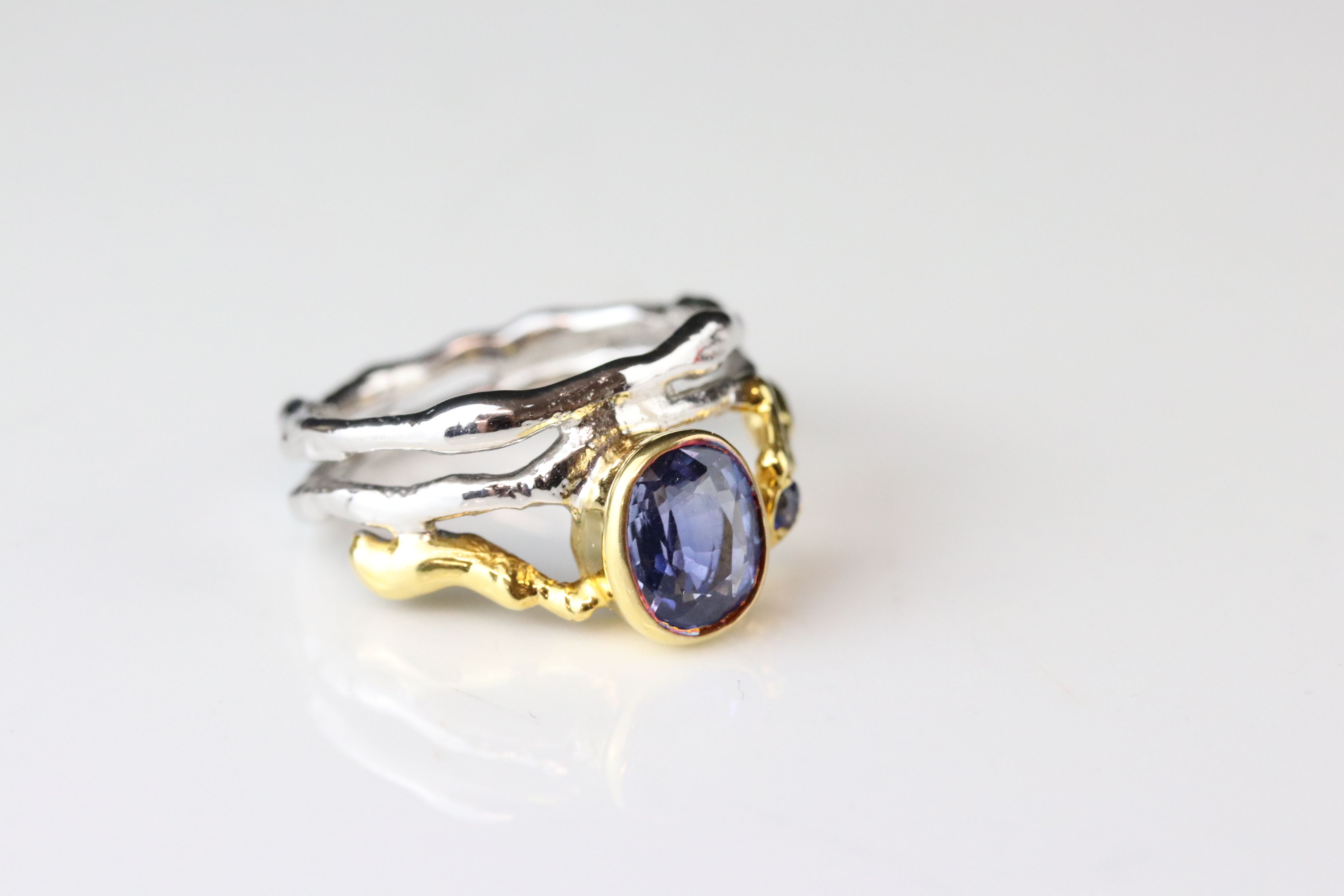 Sapphire 18ct yellow and white gold ring, the principle oval mixed cut blue sapphire measuring - Image 2 of 7