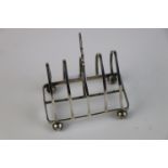 A fully hallmarked sterling silver toast rack, maker marked for John Collard Vickery, assayed in