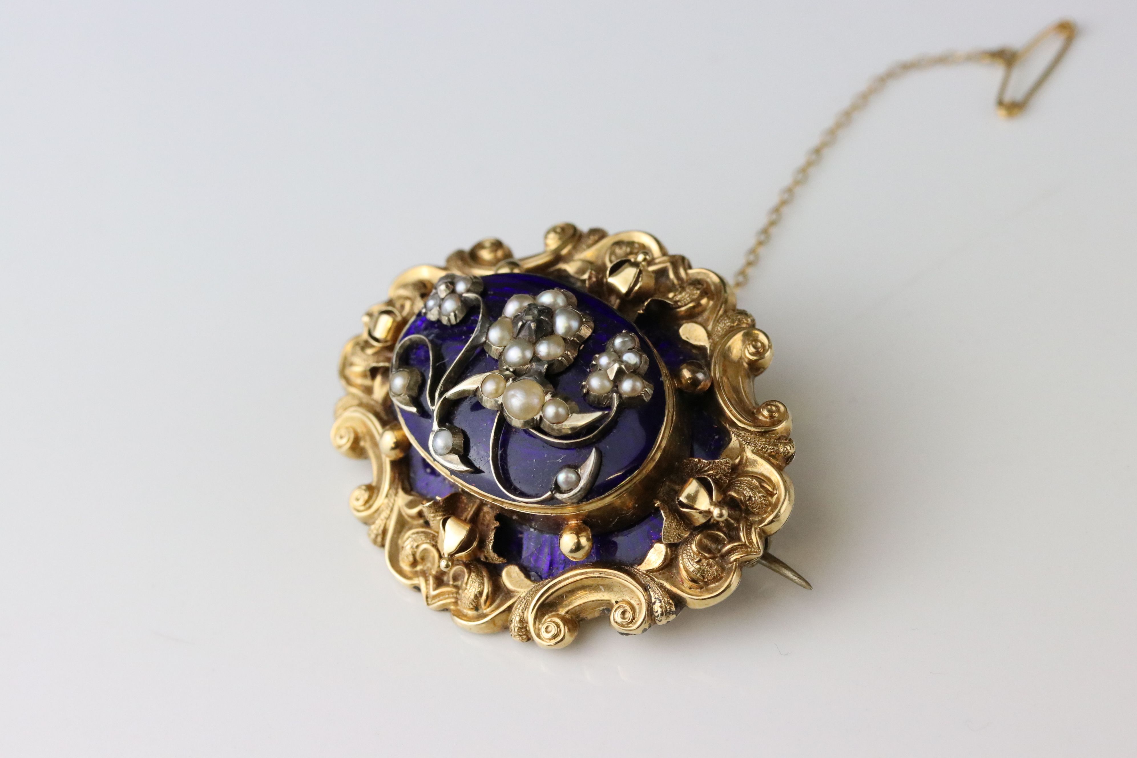 Victorian diamond, seed pearl and enamelled yellow metal brooch, the central raised blue enamelled - Image 2 of 5