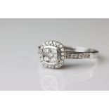 Diamond cluster 18ct white gold ring, nine small round brilliant cut diamonds to central cluster,