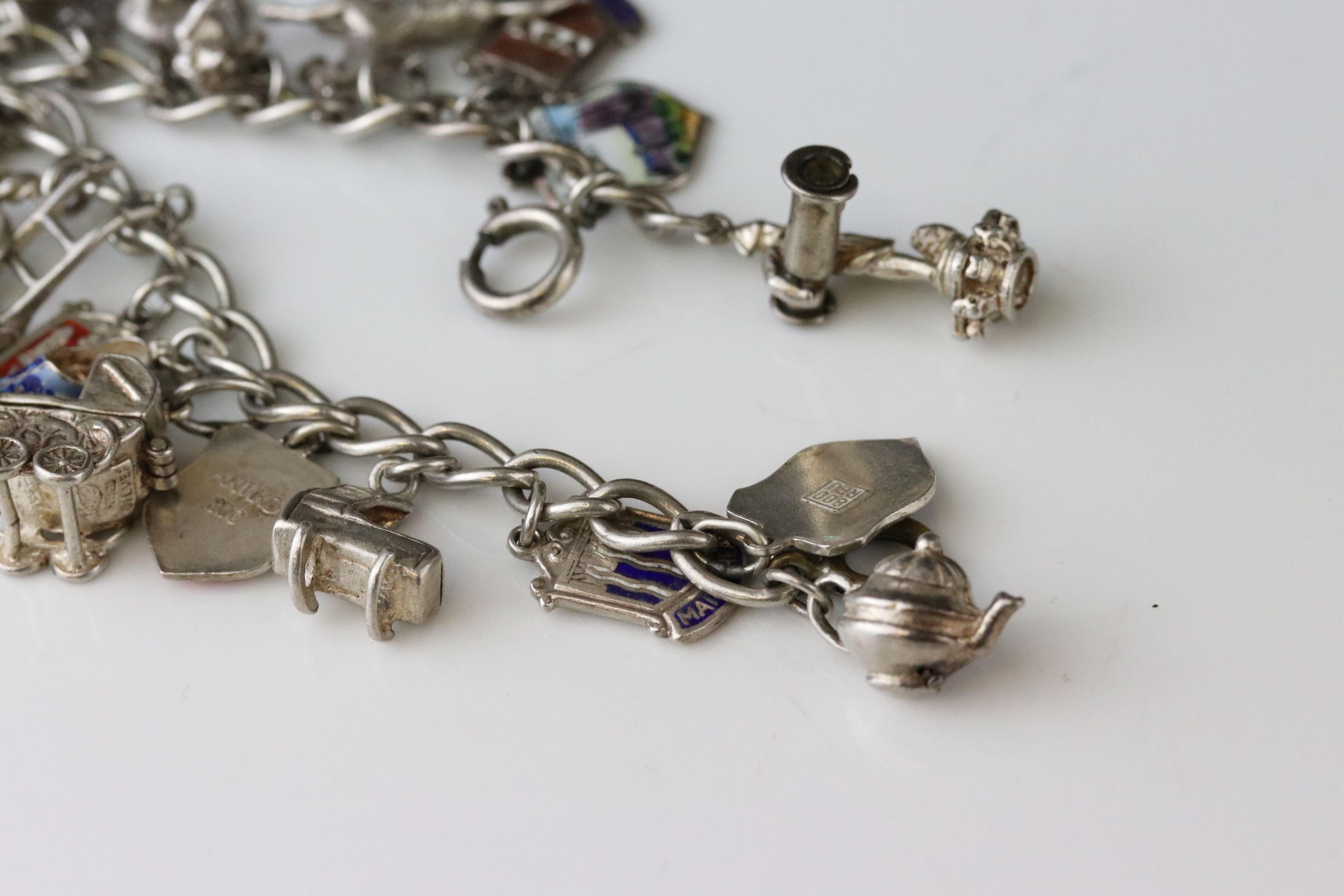 Silver curb link charm bracelet with eighteen silver and white metal charms, length approx 23cm ( - Image 12 of 15