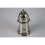 A fully hallmarked sterling silver pepper grinder, maker marked for Vander & Hedges (Arthur Martin