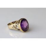 Amethyst 9ct yellow gold ring, the oval mixed cut diamond measuring approx 15mm x 11.5mm, collet