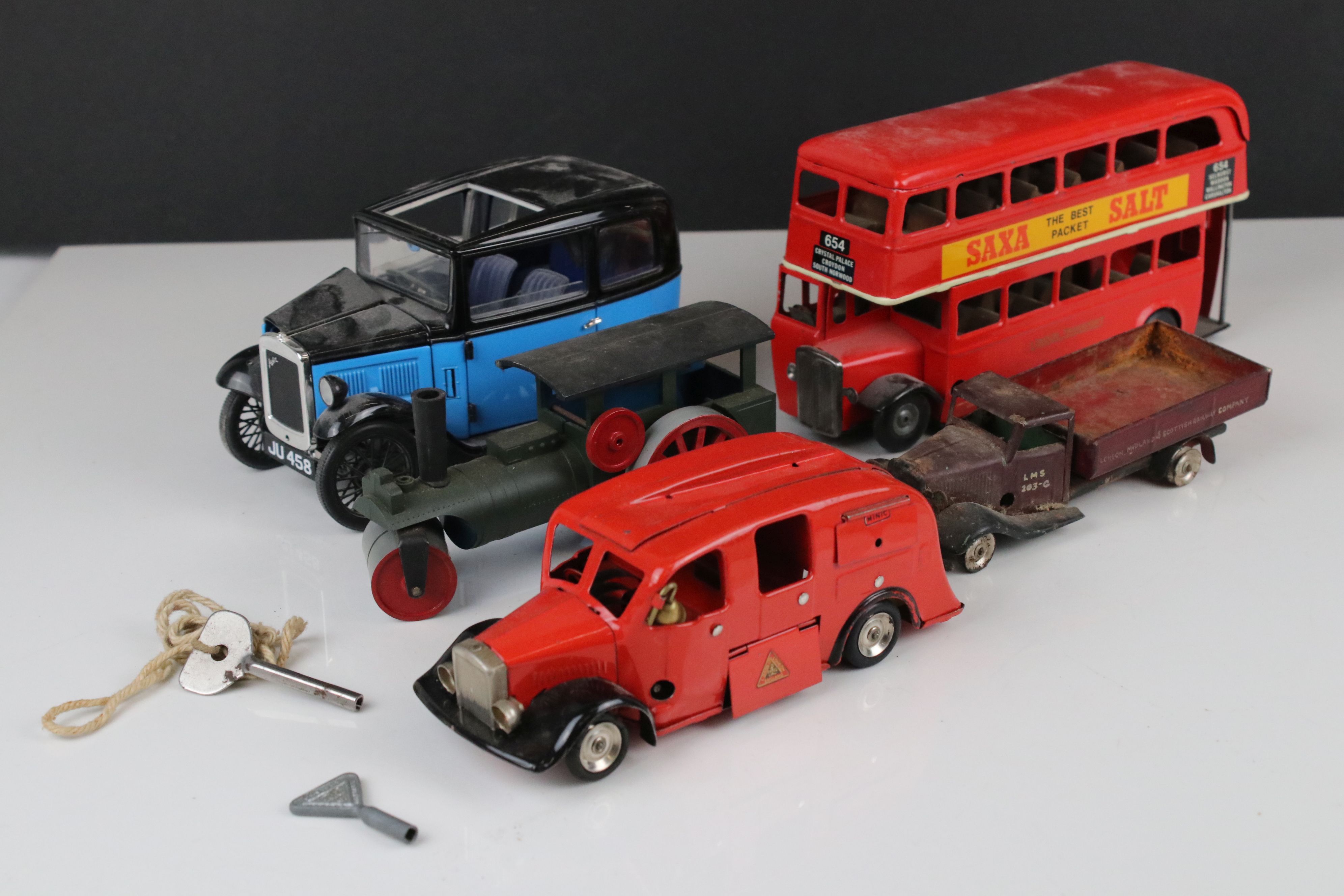Five diecast / tin plate / plastic models to include Clockwork Triang Minic Bus, Triang Minic fire