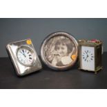 A group of mixed collectables to include a carriage clock, a white metal circular frame and a