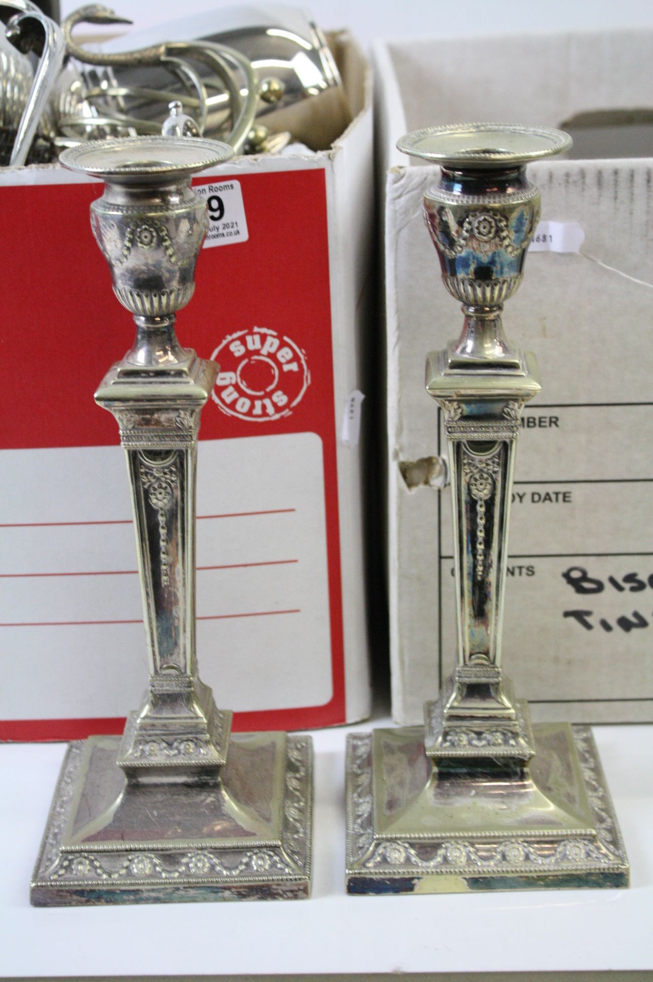 A large quantity of silver plated items contained within two boxes to include candlesticks, toast - Image 6 of 7