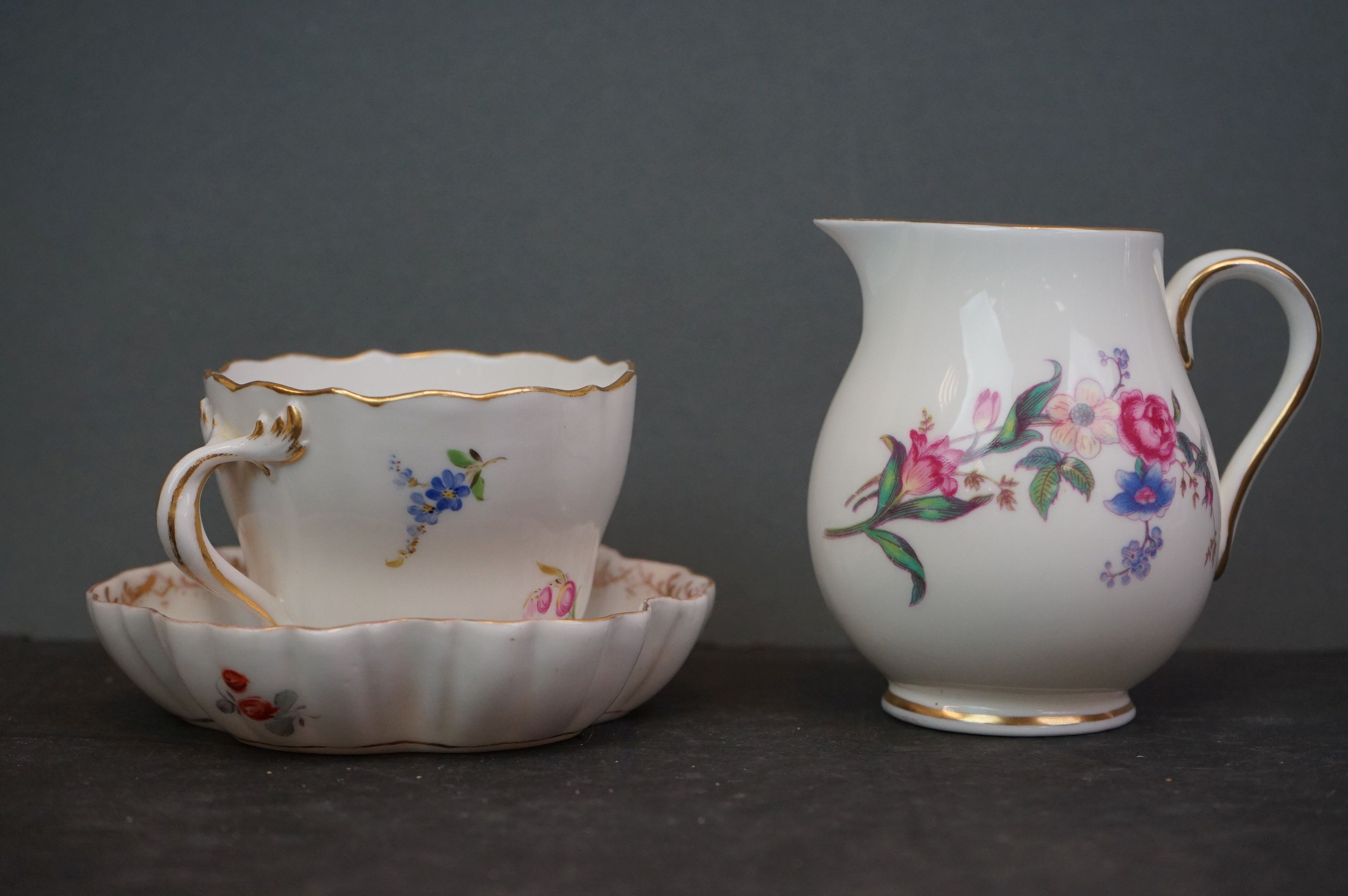 A collection of Meissen and Dresden porcelain to include plates, cups and dishes. - Image 12 of 13