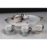 Continental Porcelain Cabinet Tete a Tete Tea Set, of moulded form comprising two cups with swan