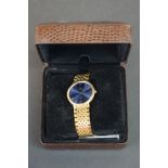 A gents Omega de Ville quartz wristwatch with blue dial and original strap.