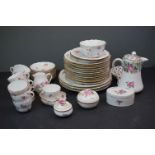 A collection of Meissen and Dresden porcelain to include plates, cups and dishes.